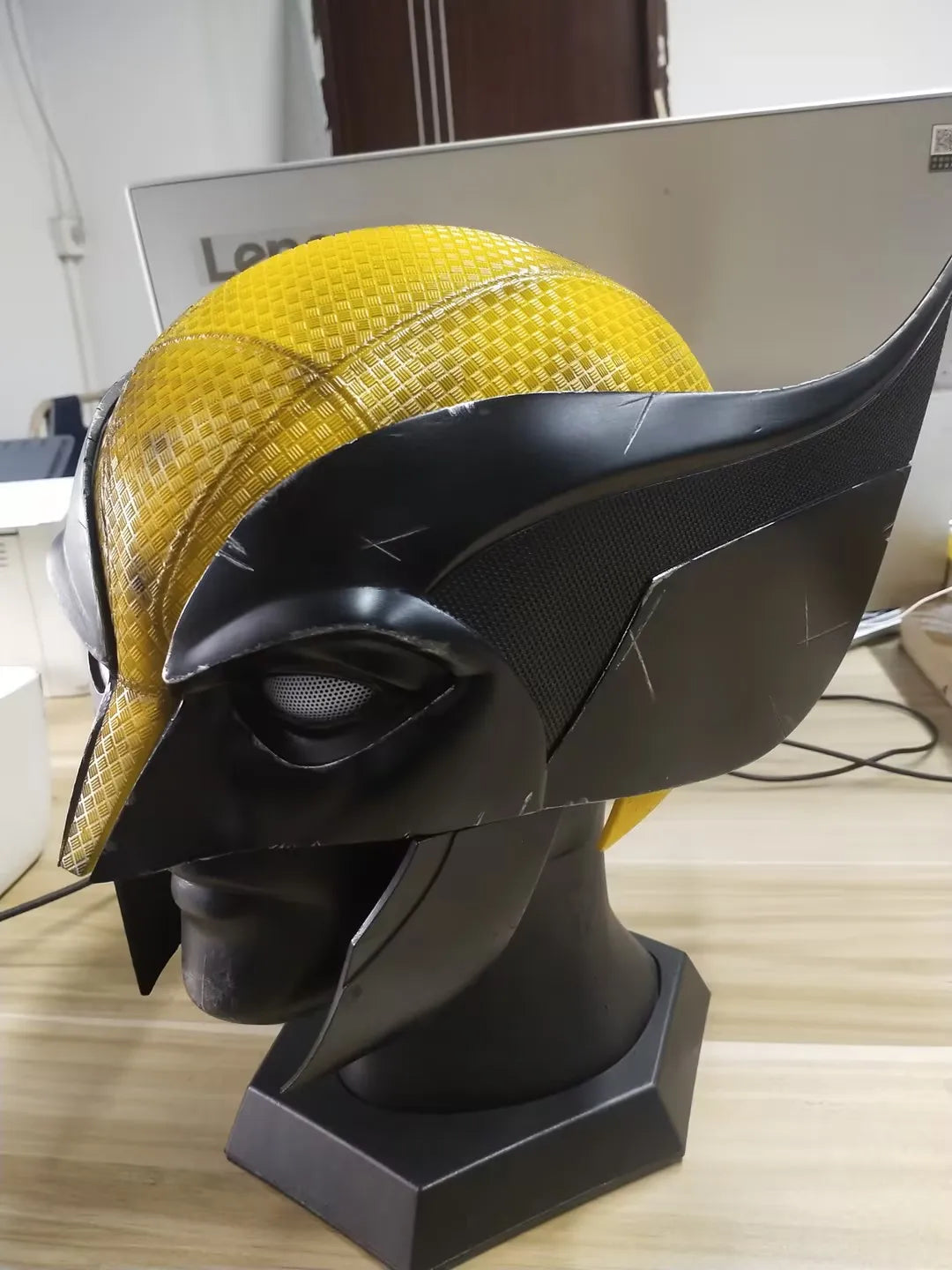Wolverine Yellow and Black Cowl Battle Damage